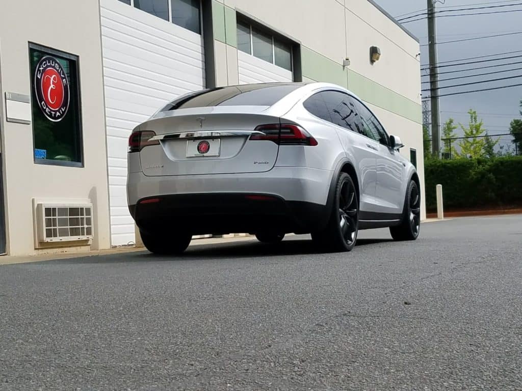 White Tesla Model X with paint protection film