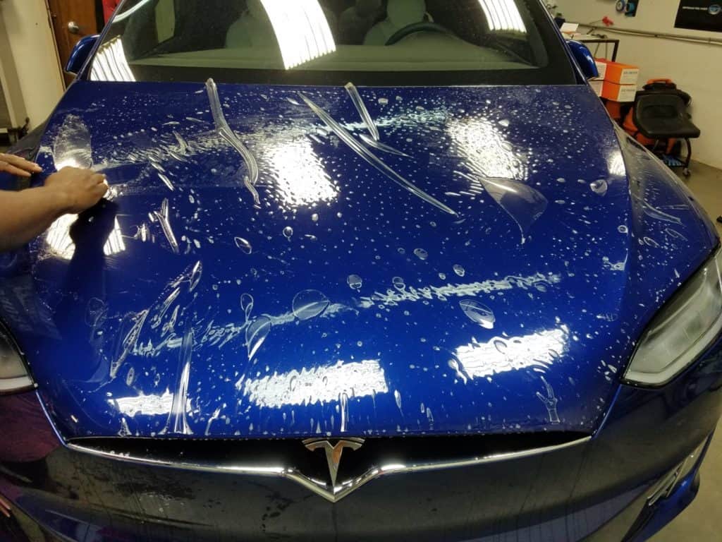 Tesla model X paint protection being installed